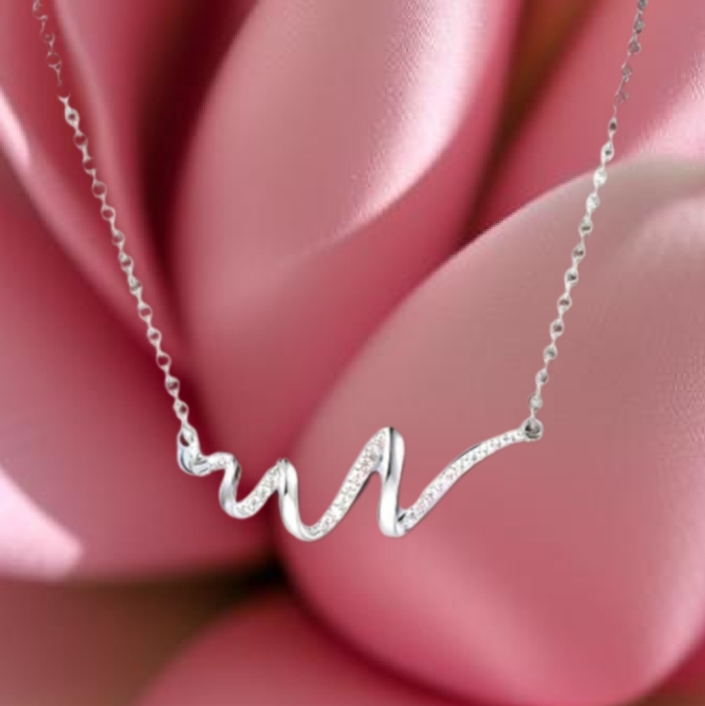 - Nwt! Beautiful silver swirl necklace